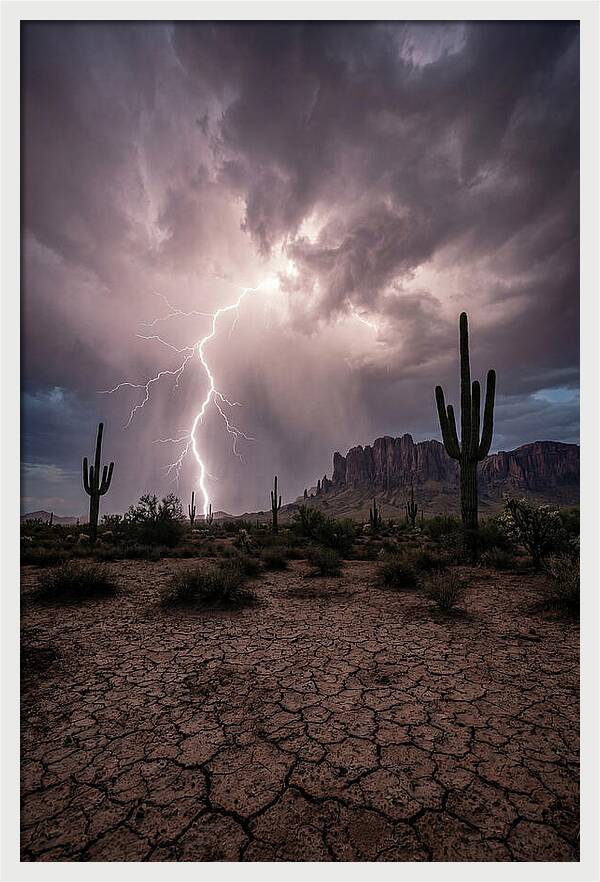 Lightning Strikes Over Desert Landscape