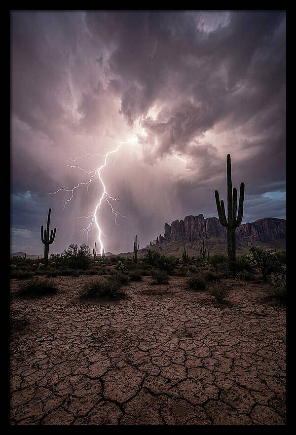 Lightning Strikes Over Desert Landscape