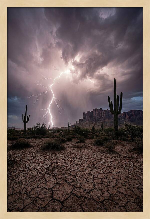 Lightning Strikes Over Desert Landscape