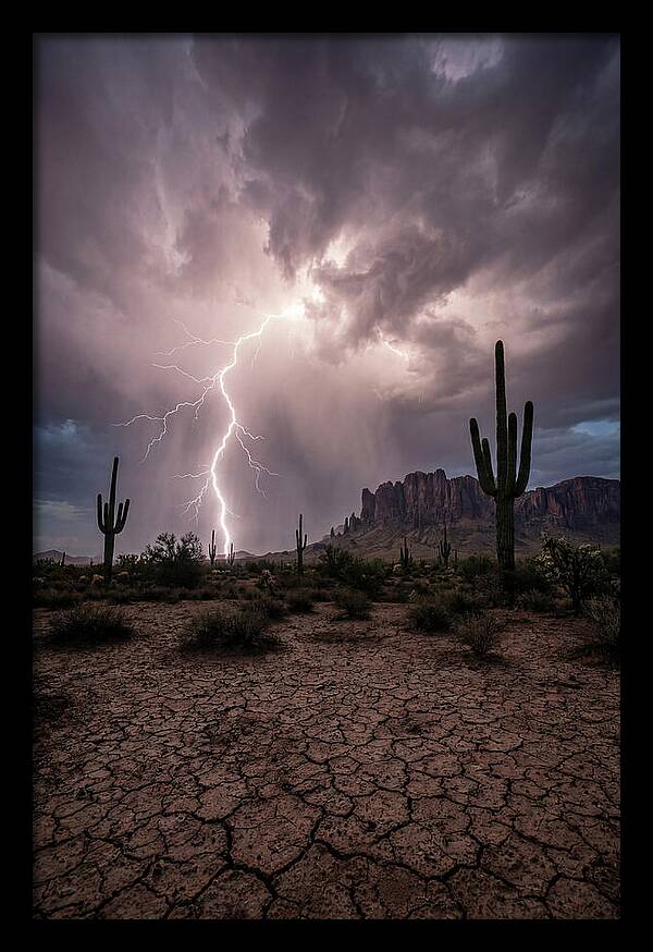 Lightning Strikes Over Desert Landscape