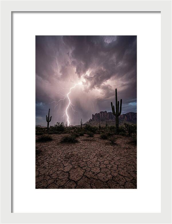 Lightning Strikes Over Desert Landscape