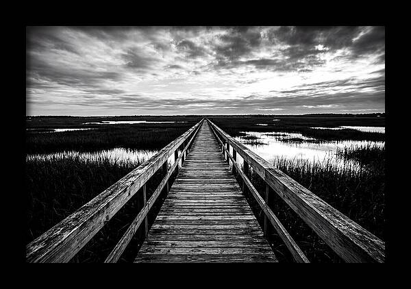 Long Wooden Boardwalk Over Marsh