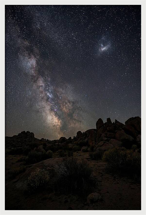 Magellanic Clouds Over Desert Landscape