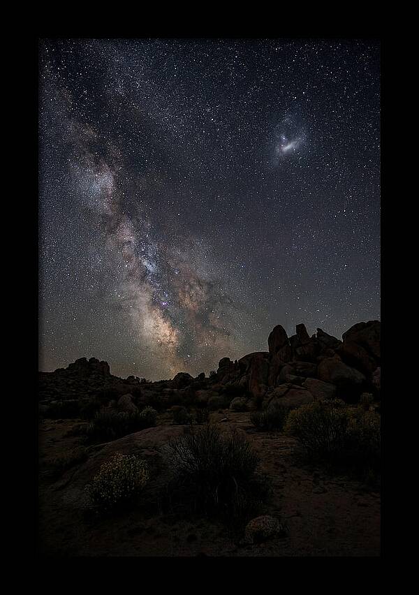 Magellanic Clouds Over Desert Landscape