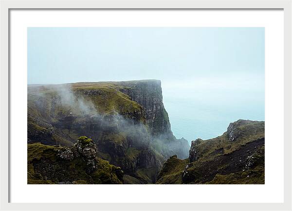 Majestic Cliff Overlooking Serene Lake