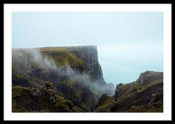 Majestic Cliff Overlooking Serene Lake