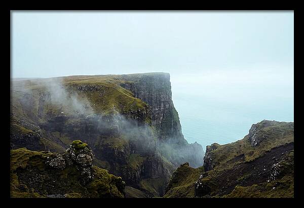 Majestic Cliff Overlooking Serene Lake