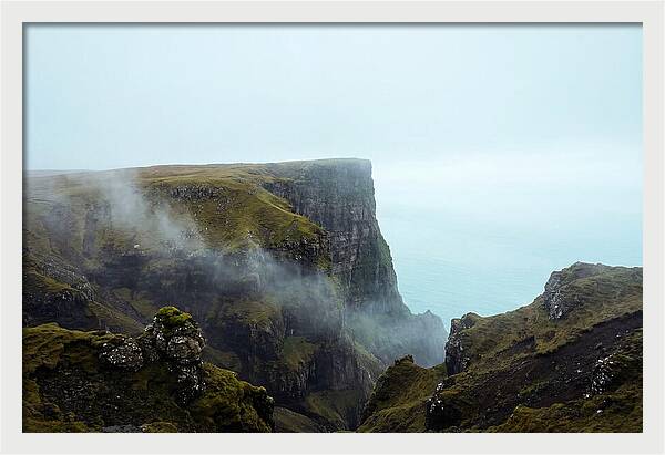 Majestic Cliff Overlooking Serene Lake