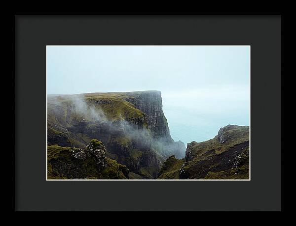 Majestic Cliff Overlooking Serene Lake