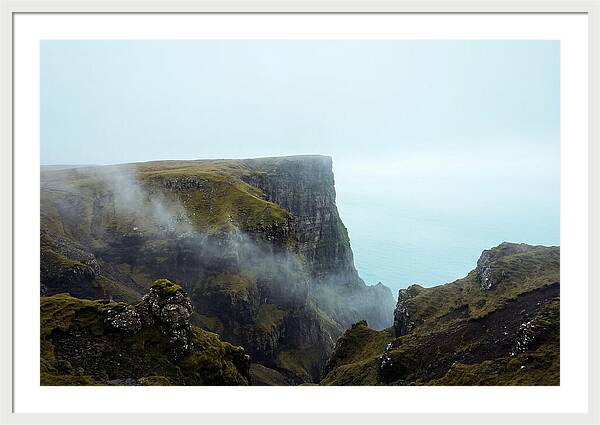Majestic Cliff Overlooking Serene Lake