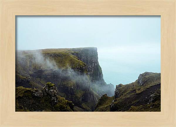 Majestic Cliff Overlooking Serene Lake
