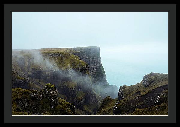 Majestic Cliff Overlooking Serene Lake