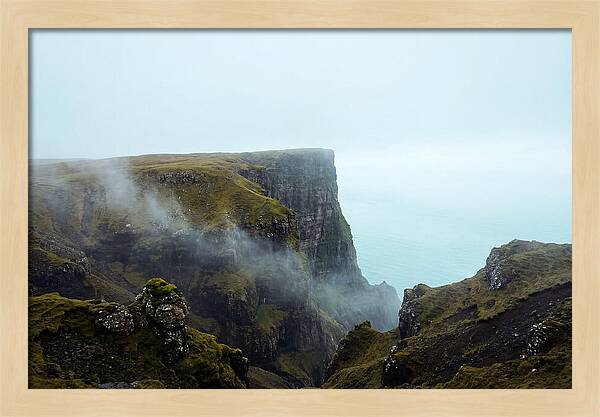 Majestic Cliff Overlooking Serene Lake