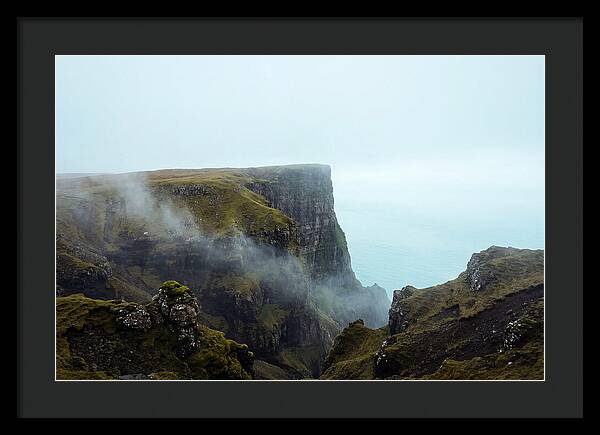 Majestic Cliff Overlooking Serene Lake