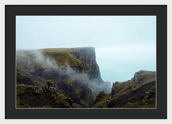 Majestic Cliff Overlooking Serene Lake