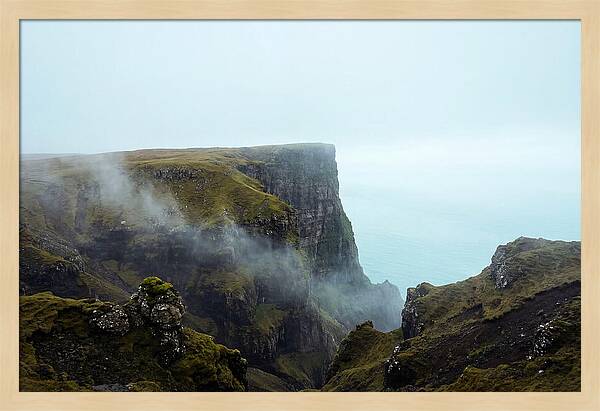 Majestic Cliff Overlooking Serene Lake