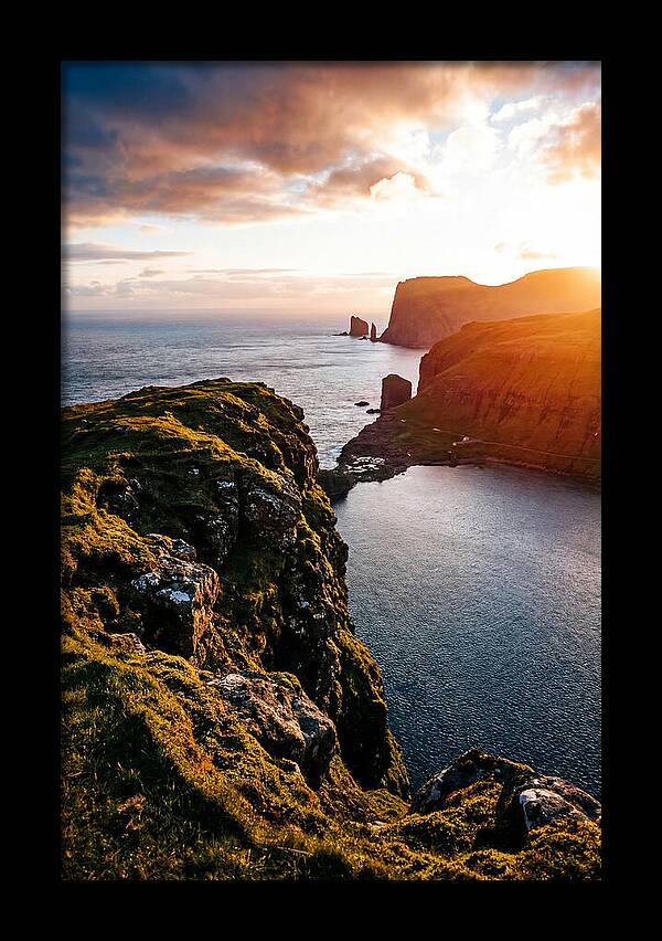 Majestic Cliffs Over Serene Lake