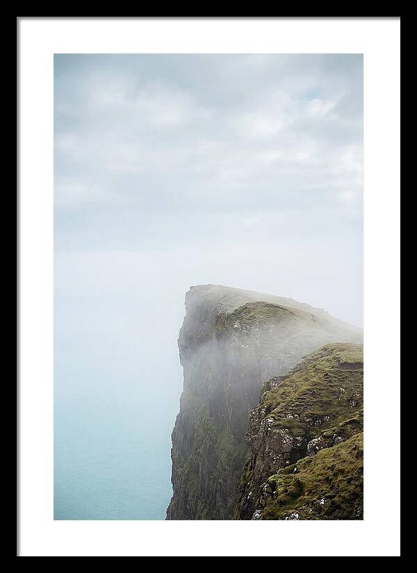 Majestic Cliffs Overlooking Lake Srvgsvatn