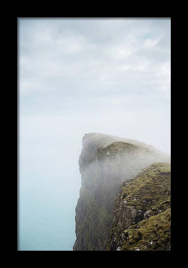 Majestic Cliffs Overlooking Lake Srvgsvatn