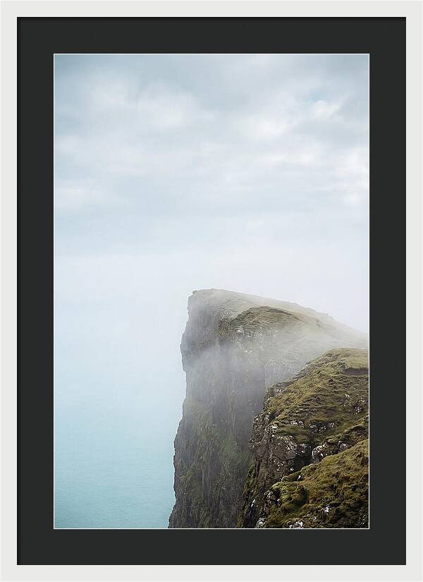 Majestic Cliffs Overlooking Lake Srvgsvatn