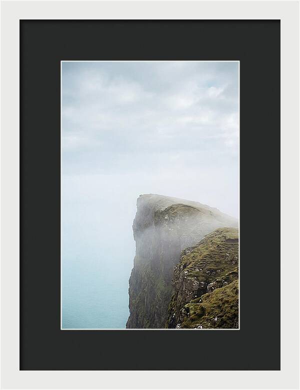 Majestic Cliffs Overlooking Lake Srvgsvatn