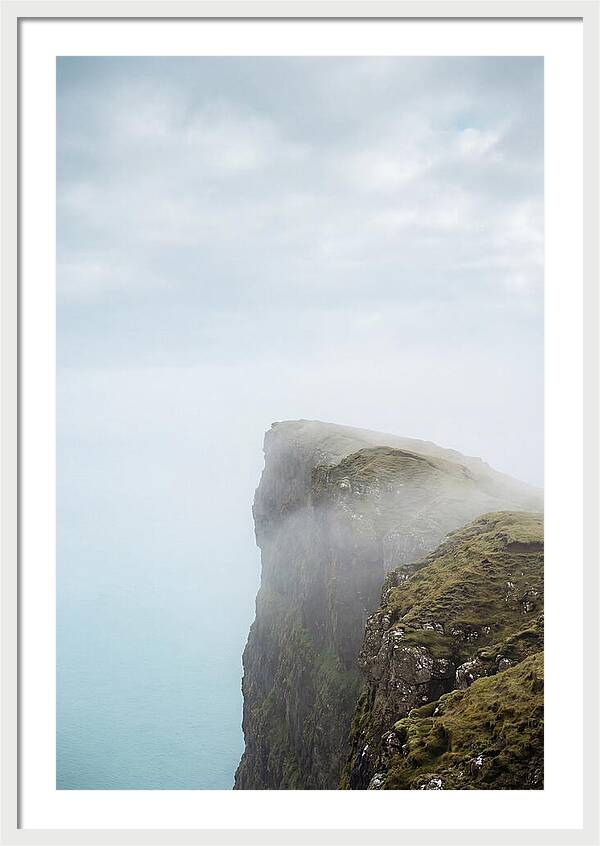 Majestic Cliffs Overlooking Lake Srvgsvatn