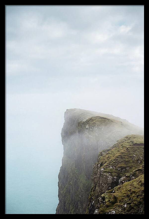 Majestic Cliffs Overlooking Lake Srvgsvatn