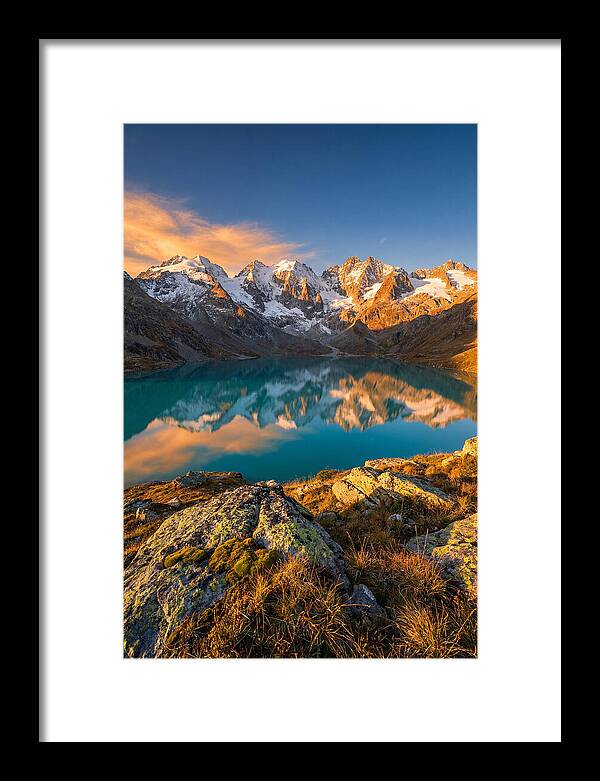 Majestic Peaks Reflected In Tranquil Waters