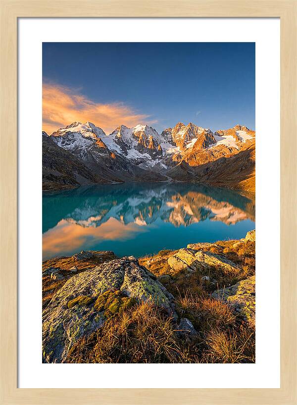 Majestic Peaks Reflected In Tranquil Waters