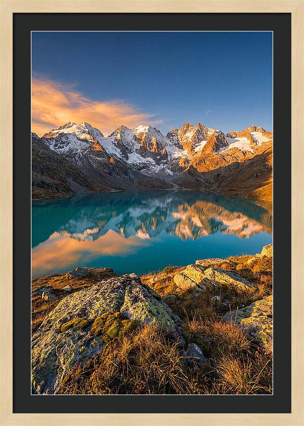 Majestic Peaks Reflected In Tranquil Waters