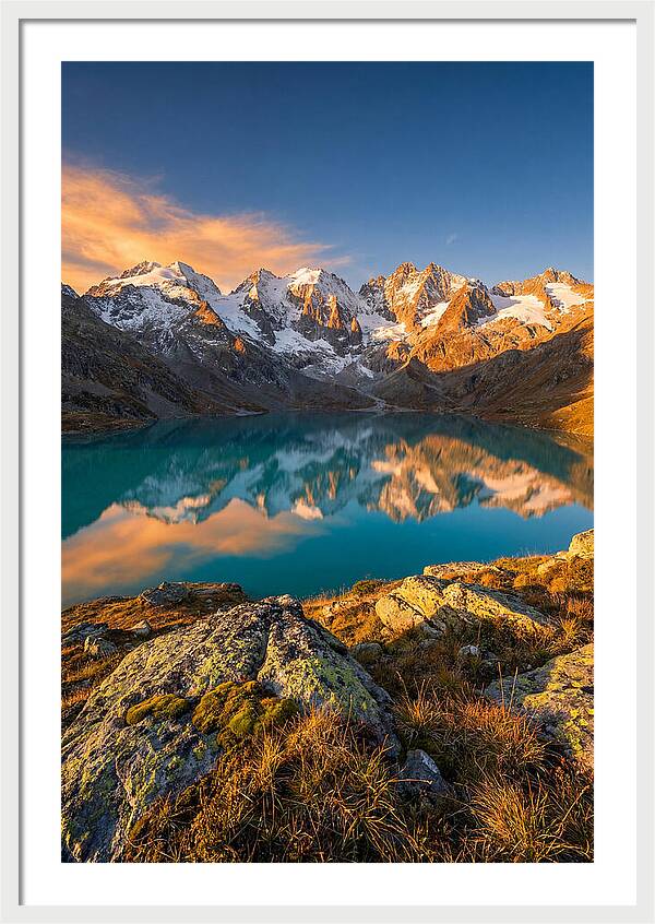 Majestic Peaks Reflected In Tranquil Waters