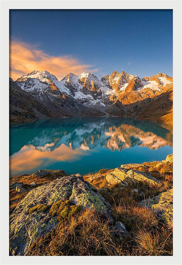 Majestic Peaks Reflected In Tranquil Waters