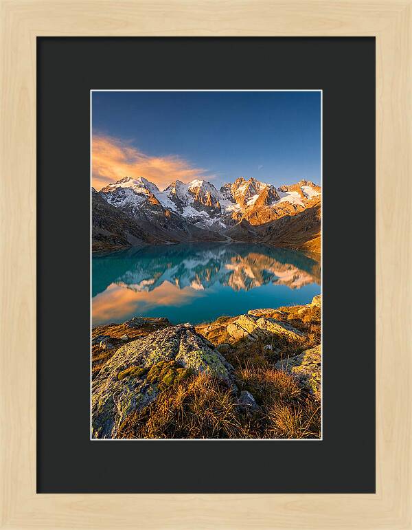Majestic Peaks Reflected In Tranquil Waters