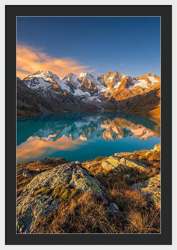 Majestic Peaks Reflected In Tranquil Waters