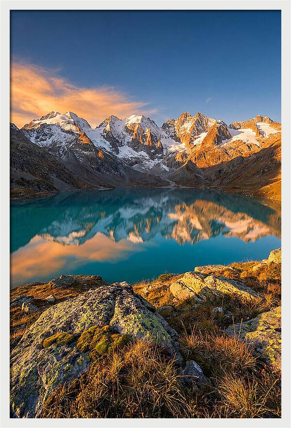 Majestic Peaks Reflected In Tranquil Waters