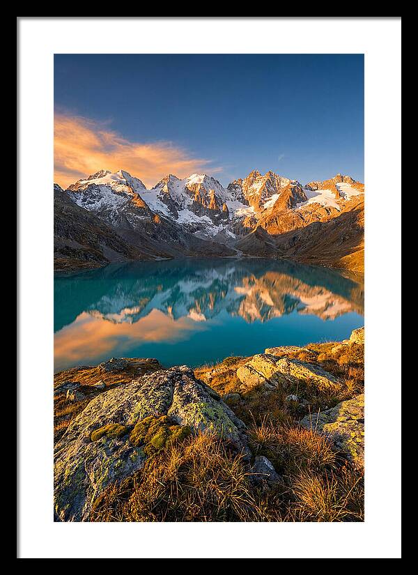 Majestic Peaks Reflected In Tranquil Waters