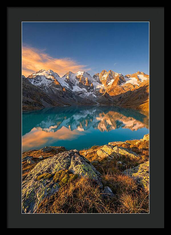Majestic Peaks Reflected In Tranquil Waters