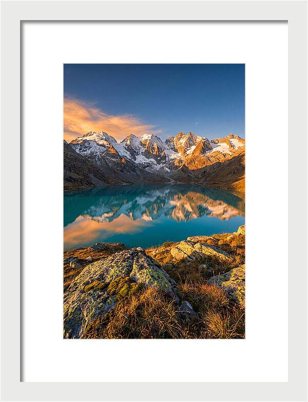Majestic Peaks Reflected In Tranquil Waters