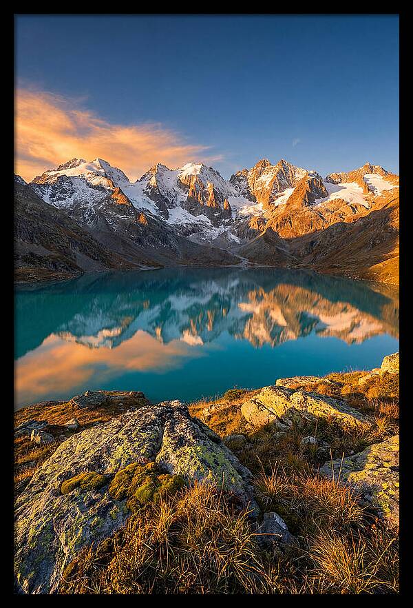Majestic Peaks Reflected In Tranquil Waters