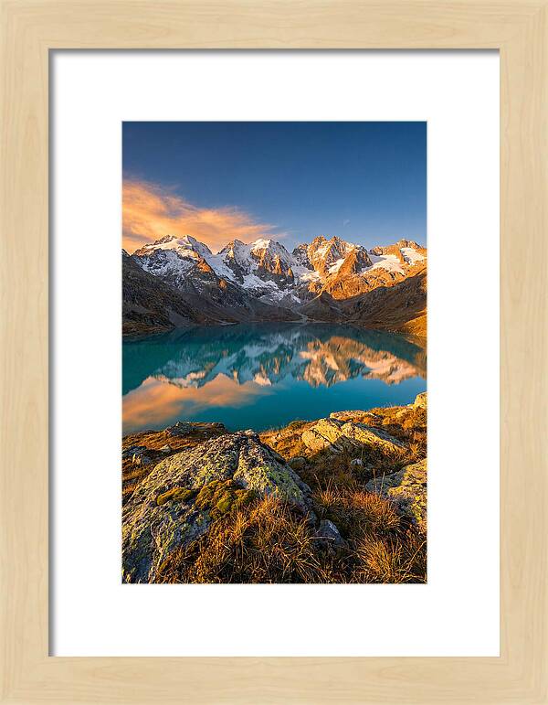 Majestic Peaks Reflected In Tranquil Waters