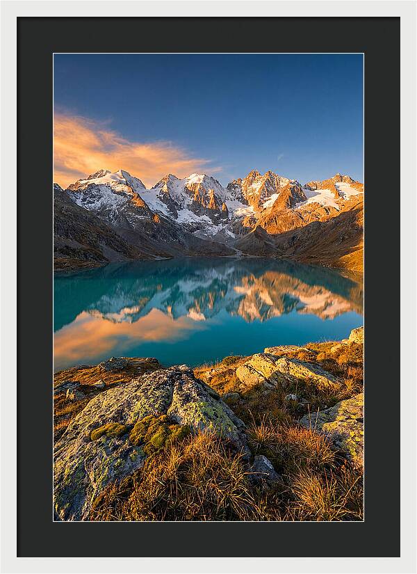 Majestic Peaks Reflected In Tranquil Waters