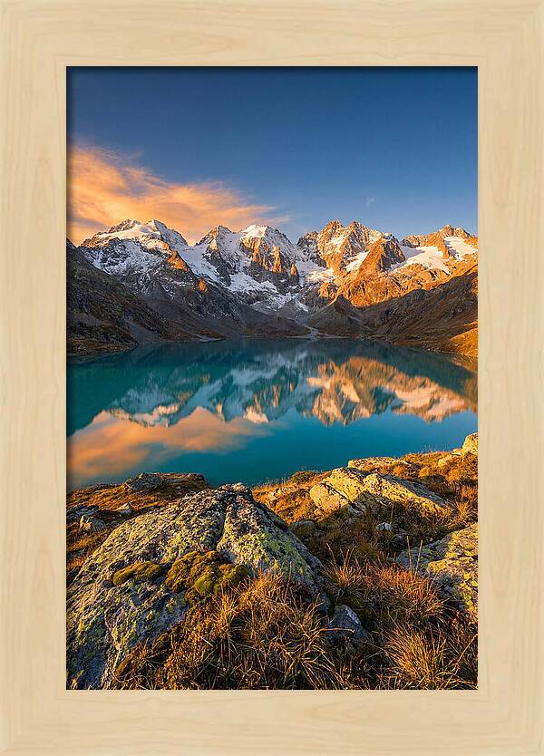 Majestic Peaks Reflected In Tranquil Waters