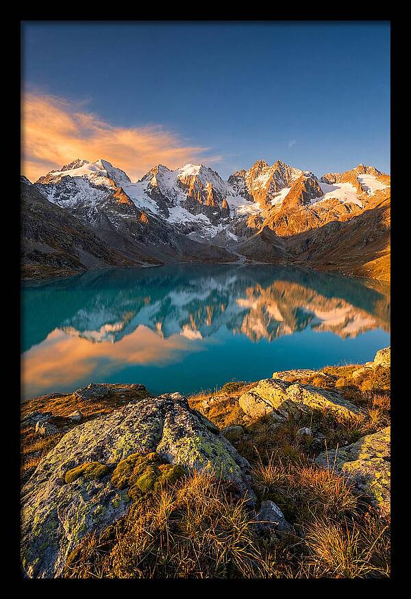 Majestic Peaks Reflected In Tranquil Waters