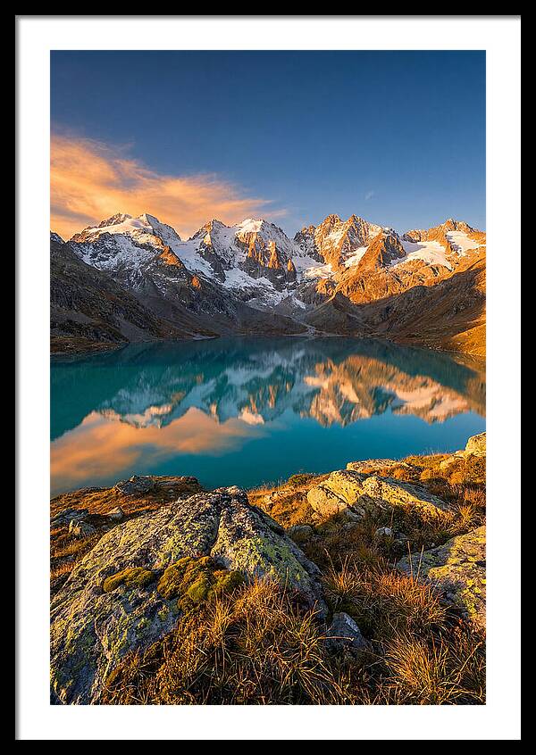 Majestic Peaks Reflected In Tranquil Waters