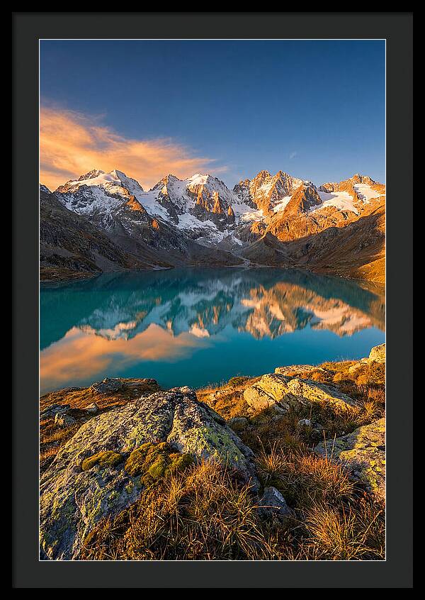 Majestic Peaks Reflected In Tranquil Waters