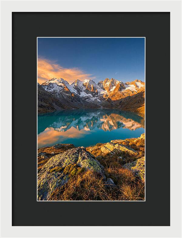 Majestic Peaks Reflected In Tranquil Waters