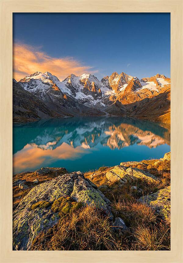 Majestic Peaks Reflected In Tranquil Waters