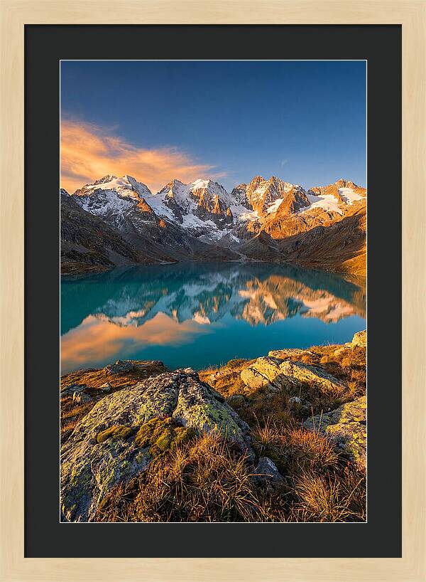 Majestic Peaks Reflected In Tranquil Waters