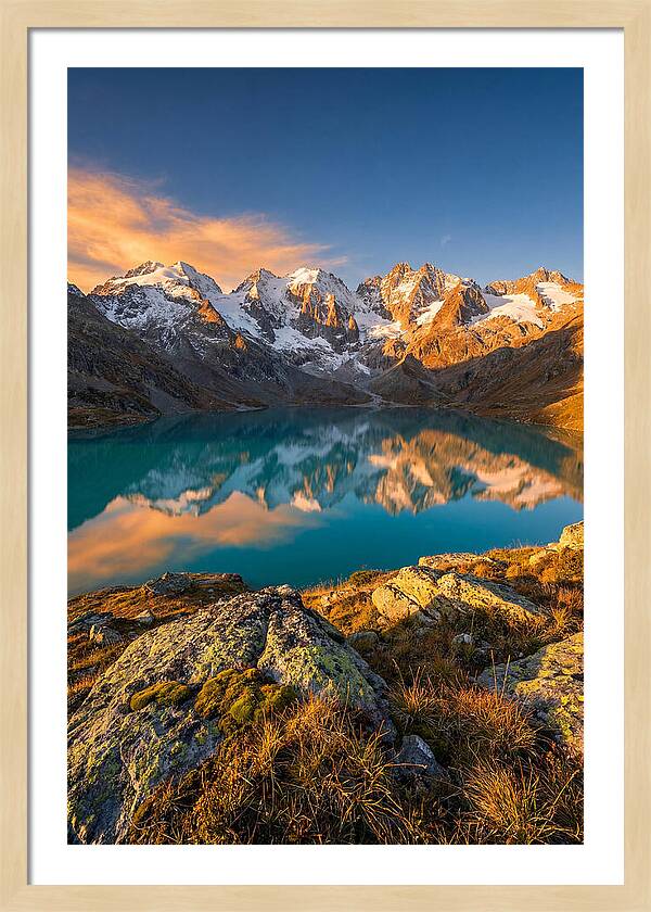 Majestic Peaks Reflected In Tranquil Waters