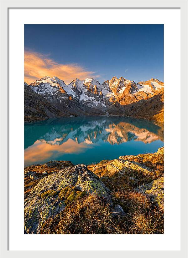 Majestic Peaks Reflected In Tranquil Waters